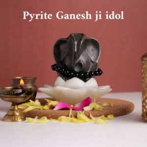 Money selenite flower with Lord Ganesha Pyrite Idol with black obsidian